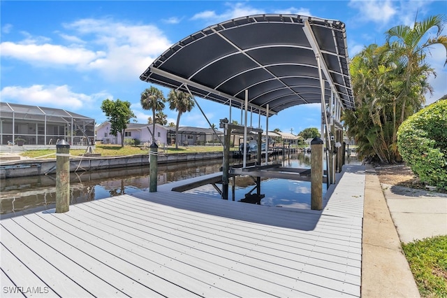 4330 S Canal Cir, North Fort Myers, FL 33903 - dock featuring a water view, boat lift, and a residential view