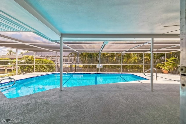 4330 S Canal Cir, North Fort Myers, FL 33903 - swimming pool featuring a patio area and a lanai
