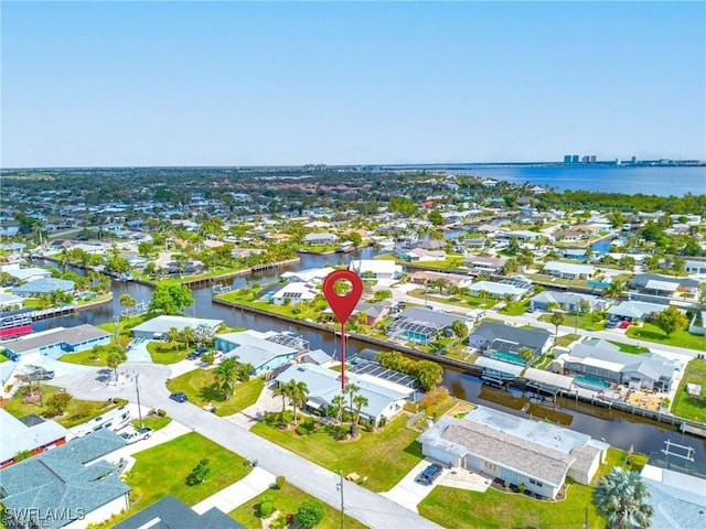 4330 S Canal Cir, North Fort Myers, FL 33903 - aerial perspective of suburban area featuring a large body of water