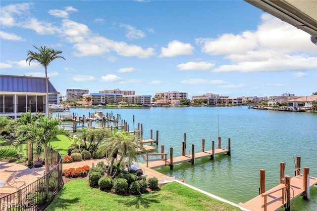 333 Harbour Dr Unit 201, Naples, FL 34103 - dock area featuring a water view and a yard