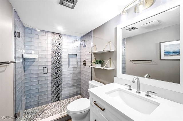 333 Harbour Dr Unit 201, Naples, FL 34103 - bathroom with toilet, vanity, and a stall shower