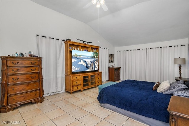 13031 9th St, Fort Myers, FL 33905 - bedroom with light tile patterned flooring, vaulted ceiling, and a ceiling fan