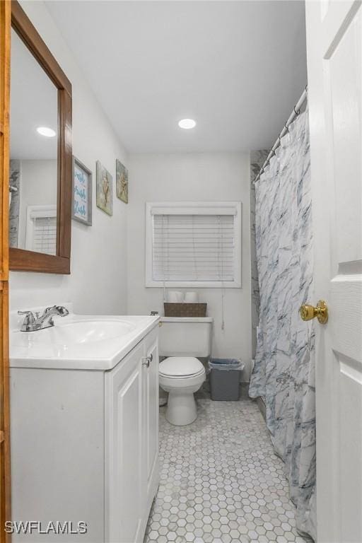13031 9th St, Fort Myers, FL 33905 - full bathroom with vanity, toilet, recessed lighting, and a shower with curtain