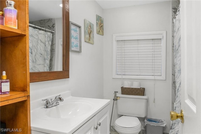 13031 9th St, Fort Myers, FL 33905 - bathroom with vanity, toilet, and a shower with curtain
