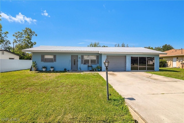 13031 9th St, Fort Myers, FL 33905 - ranch-style home with stucco siding, an attached garage, driveway, and metal roof
