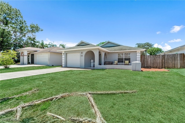 626 103rd Ave N, Naples, FL 34108 - single story home with an attached garage, driveway, and stucco siding