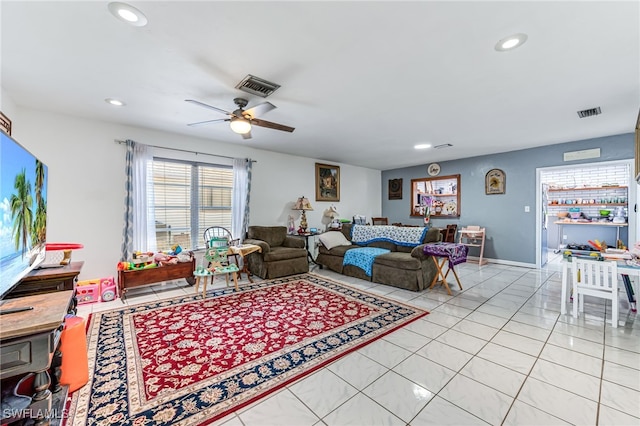 626 103rd Ave N, Naples, FL 34108 - living room with recessed lighting, ceiling fan, and light tile patterned flooring