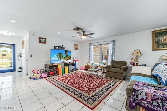 626 103rd Ave N, Naples, FL 34108 - living room featuring a ceiling fan, light tile patterned floors, and recessed lighting