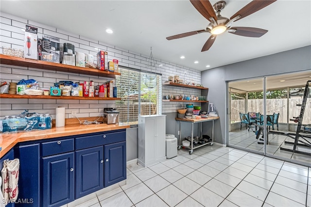 626 103rd Ave N, Naples, FL 34108 - bar area featuring a ceiling fan, recessed lighting, light tile patterned floors, baseboards, and tasteful backsplash