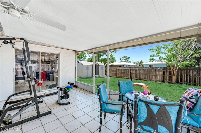 626 103rd Ave N, Naples, FL 34108 - sunroom featuring ceiling fan and outdoor dining space