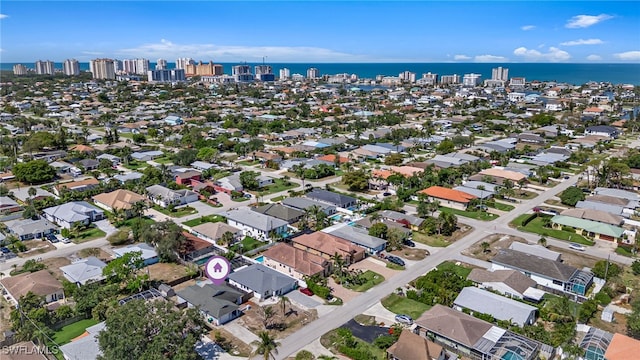 626 103rd Ave N, Naples, FL 34108 - aerial view of property's location featuring a large body of water and skyline