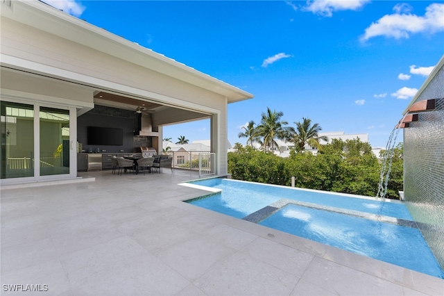 217 13th St S, Naples, FL 34102 - view of pool featuring a patio area, a pool with connected hot tub, and outdoor dining space