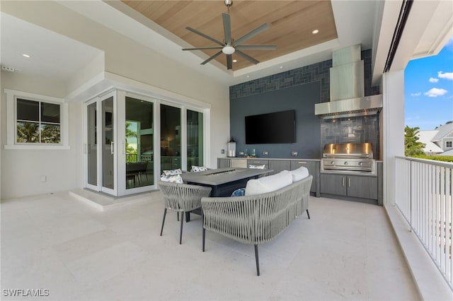 217 13th St S, Naples, FL 34102 - view of patio / terrace with a grill, exterior kitchen, and ceiling fan