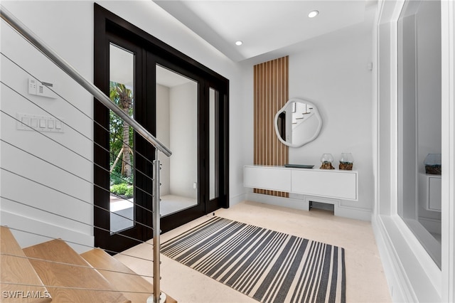 217 13th St S, Naples, FL 34102 - entrance foyer with stairway, carpet flooring, and recessed lighting
