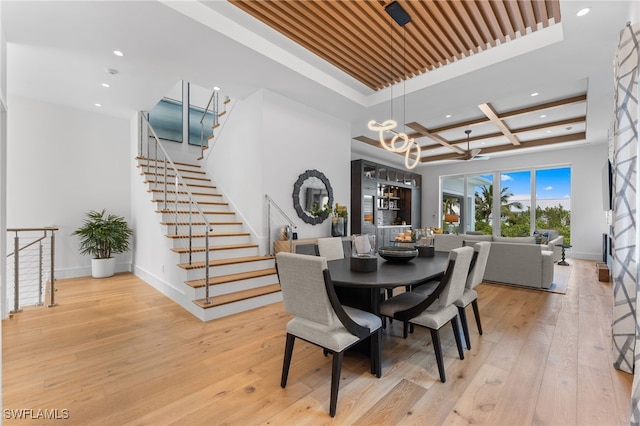 217 13th St S, Naples, FL 34102 - dining room with recessed lighting, wood-type flooring, baseboards, stairs, and coffered ceiling