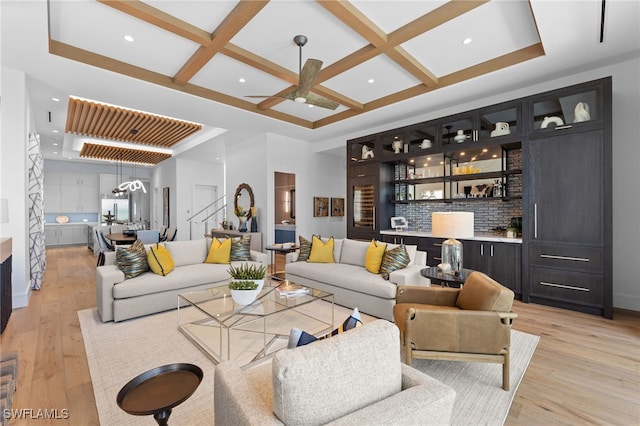 217 13th St S, Naples, FL 34102 - living room with bar with sink, coffered ceiling, light wood-style flooring, a ceiling fan, and recessed lighting