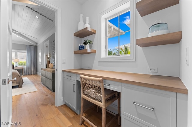 217 13th St S, Naples, FL 34102 - office space with built in study area, light wood finished floors, vaulted ceiling, recessed lighting, and wood ceiling