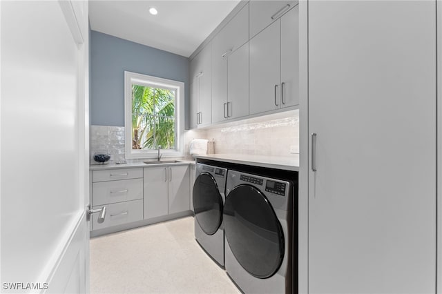 217 13th St S, Naples, FL 34102 - laundry area featuring independent washer and dryer, cabinet space, and recessed lighting