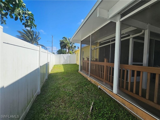 3903 1st St SW, Lehigh Acres, FL 33976 - view of yard featuring a sunroom