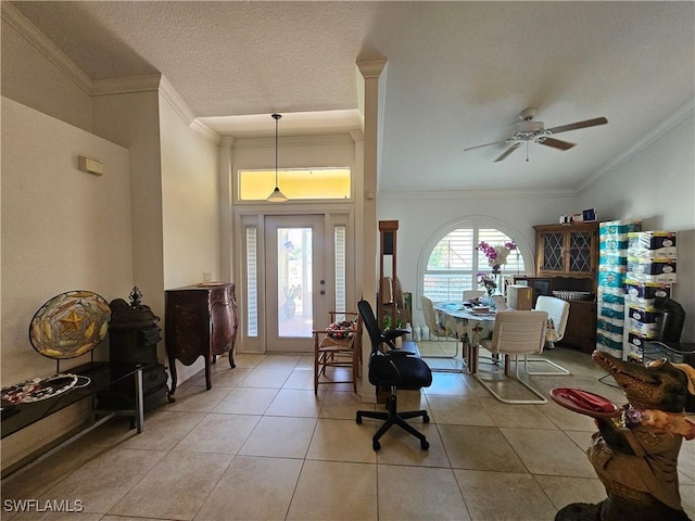 3903 1st St SW, Lehigh Acres, FL 33976 - entryway featuring ceiling fan, light tile patterned floors, and crown molding