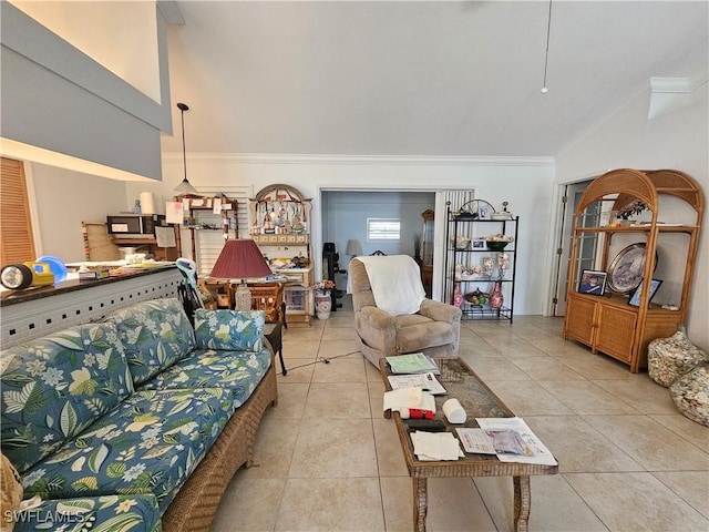 3903 1st St SW, Lehigh Acres, FL 33976 - living area featuring vaulted ceiling, ornamental molding, and tile patterned flooring