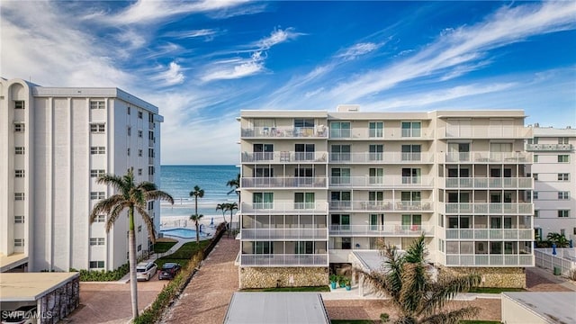 1977 Gulf Shore Blvd N Unit 302, Naples, FL 34102 - view of apartment building / complex with a water view