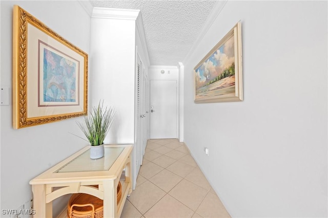 1977 Gulf Shore Blvd N Unit 302, Naples, FL 34102 - hall with a textured ceiling, light tile patterned floors, and ornamental molding