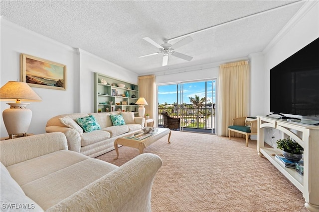 1977 Gulf Shore Blvd N Unit 302, Naples, FL 34102 - living area featuring a ceiling fan, ornamental molding, carpet, and a textured ceiling
