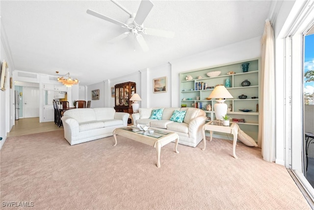 1977 Gulf Shore Blvd N Unit 302, Naples, FL 34102 - living area featuring carpet flooring and a ceiling fan