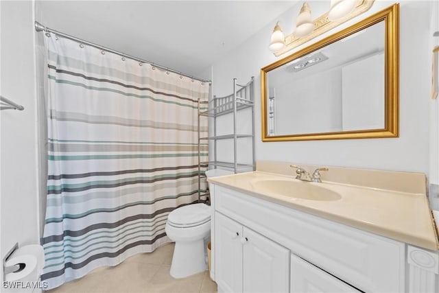 1977 Gulf Shore Blvd N Unit 302, Naples, FL 34102 - bathroom featuring tile patterned flooring, vanity, toilet, and curtained shower
