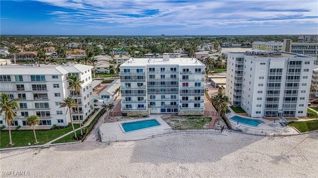1977 Gulf Shore Blvd N Unit 302, Naples, FL 34102 - bird's eye view of a pool area and apartment complex / building