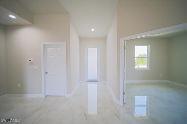 3711 6th St W, Lehigh Acres, FL 33971 - entrance foyer featuring light marble finish floors, recessed lighting, and baseboards