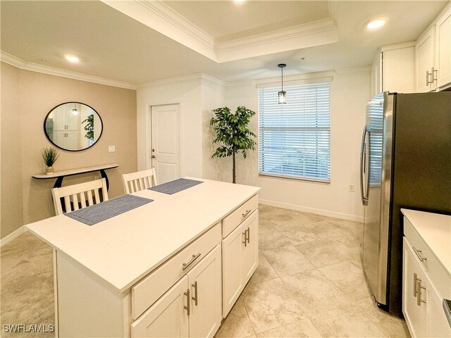 6023 Ellerston Way Unit 1816, Ave Maria, FL 34142 - kitchen featuring freestanding refrigerator, recessed lighting, white cabinetry, crown molding, and light countertops