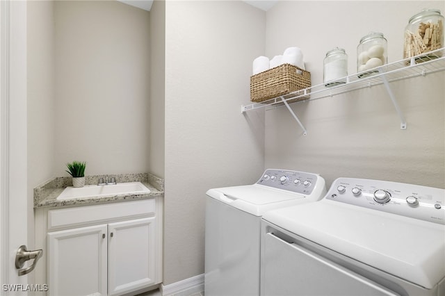 19694 Deming Ln, Estero, FL 33928 - washroom featuring washing machine and clothes dryer and cabinet space
