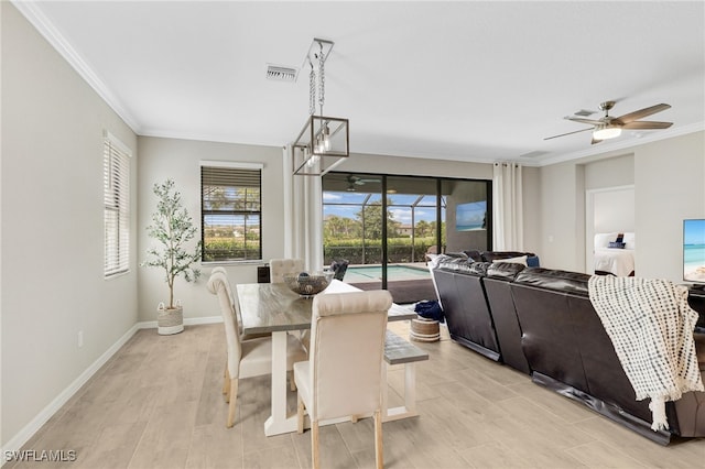 19694 Deming Ln, Estero, FL 33928 - dining space with ornamental molding and ceiling fan