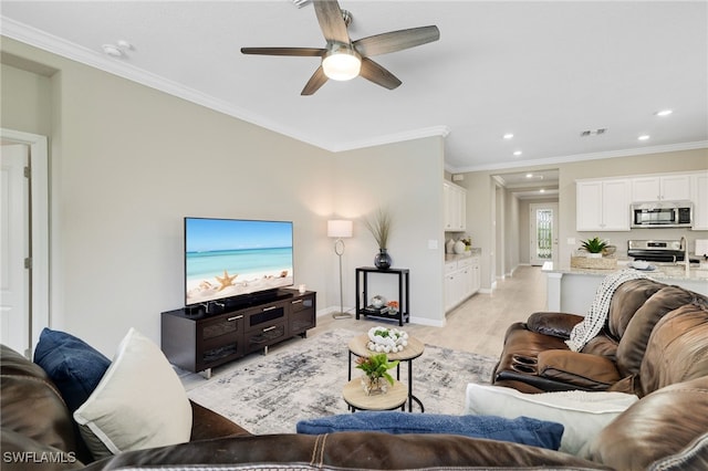 19694 Deming Ln, Estero, FL 33928 - living room with a ceiling fan, recessed lighting, light wood-type flooring, and crown molding
