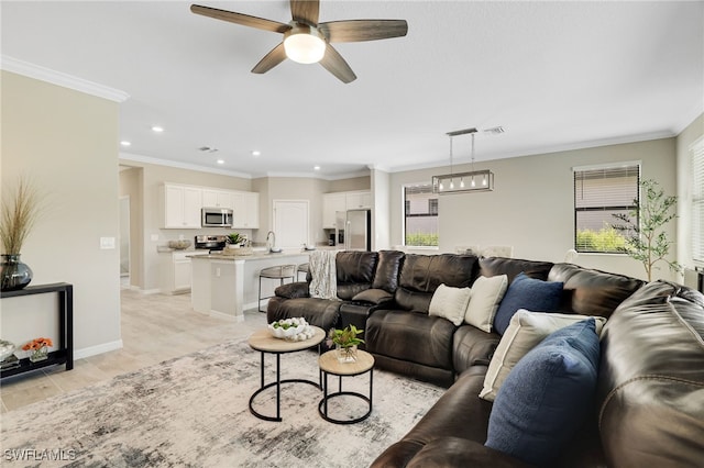 19694 Deming Ln, Estero, FL 33928 - living room with recessed lighting, a ceiling fan, and ornamental molding