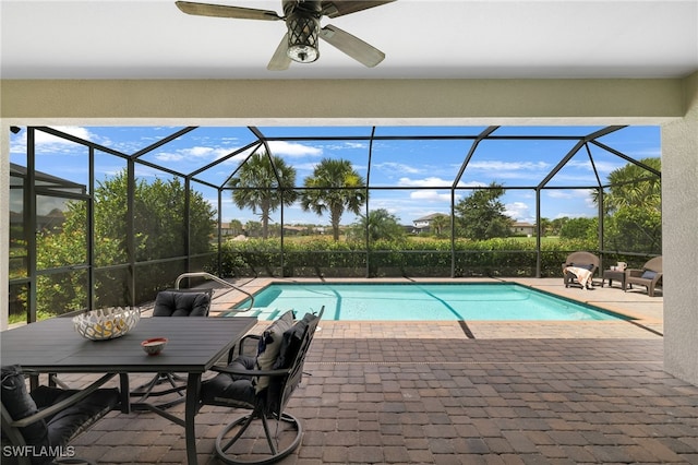 19694 Deming Ln, Estero, FL 33928 - outdoor pool featuring a patio area, ceiling fan, and a lanai