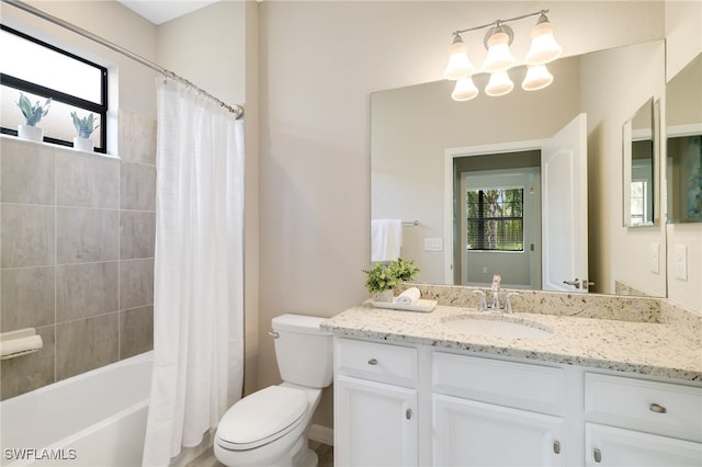 19694 Deming Ln, Estero, FL 33928 - full bath featuring vanity, plenty of natural light, shower / bath combination with curtain, and a chandelier