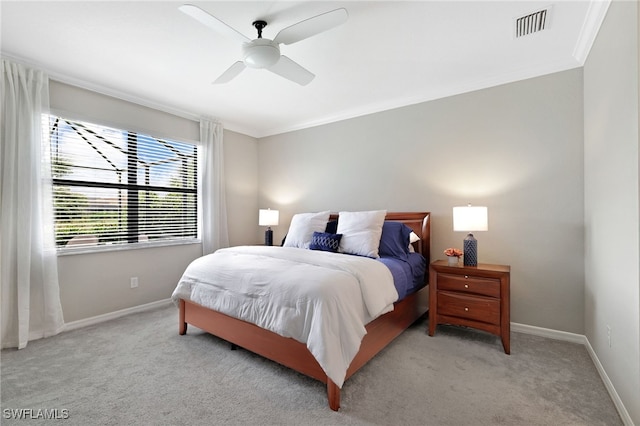 19694 Deming Ln, Estero, FL 33928 - bedroom featuring ornamental molding, light carpet, and a ceiling fan