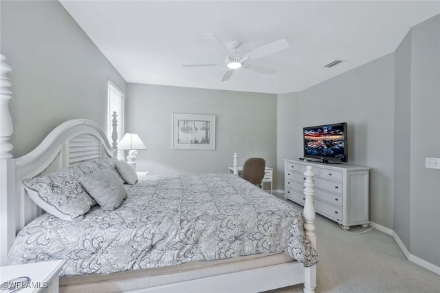 1340 Charleston Square Dr Unit 101, Naples, FL 34110 - bedroom featuring light carpet, baseboards, and ceiling fan