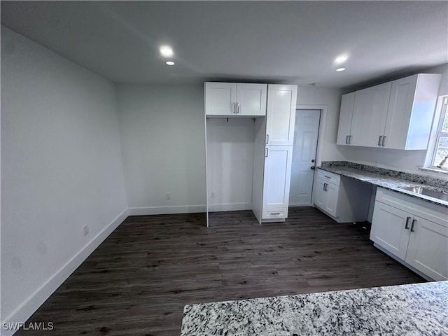 5981 Cubles Dr, Bokeelia, FL 33922 - kitchen featuring white cabinetry, baseboards, a sink, recessed lighting, and dark wood finished floors