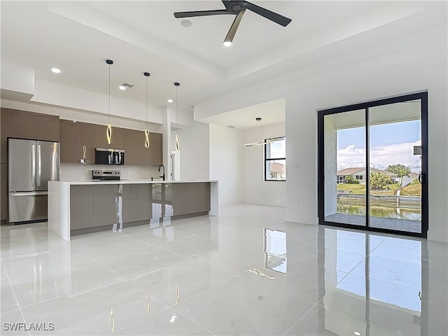 323 NE 19th Ter, Cape Coral, FL 33909 - kitchen with appliances with stainless steel finishes, modern cabinets, a ceiling fan, a sink, and recessed lighting