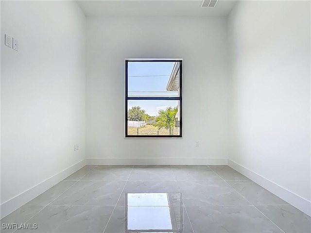 323 NE 19th Ter, Cape Coral, FL 33909 - unfurnished room featuring baseboards