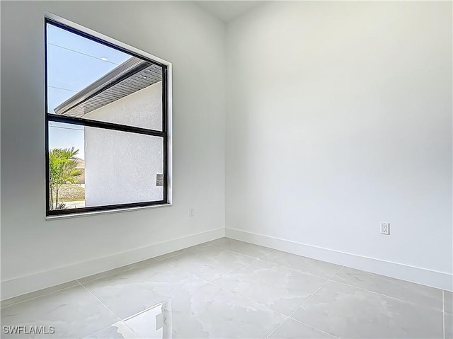 323 NE 19th Ter, Cape Coral, FL 33909 - unfurnished room featuring baseboards
