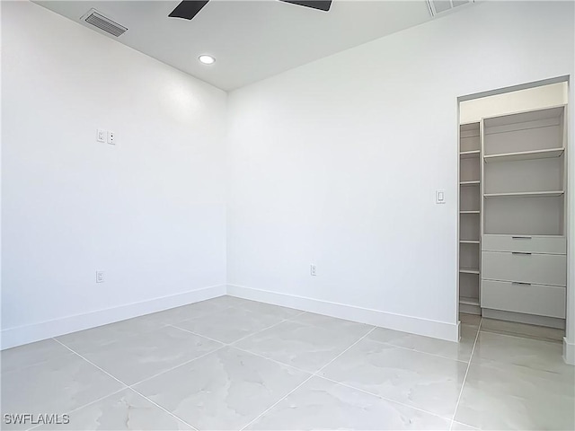 323 NE 19th Ter, Cape Coral, FL 33909 - empty room featuring baseboards and recessed lighting