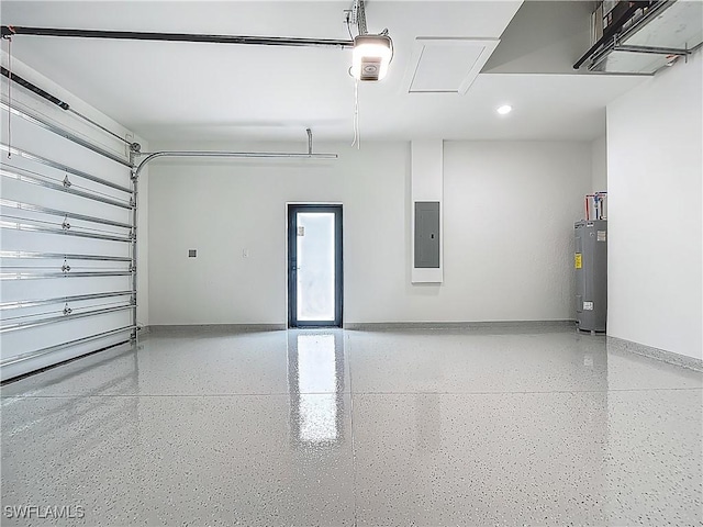 323 NE 19th Ter, Cape Coral, FL 33909 - garage featuring water heater, electric panel, recessed lighting, baseboards, and a garage door opener