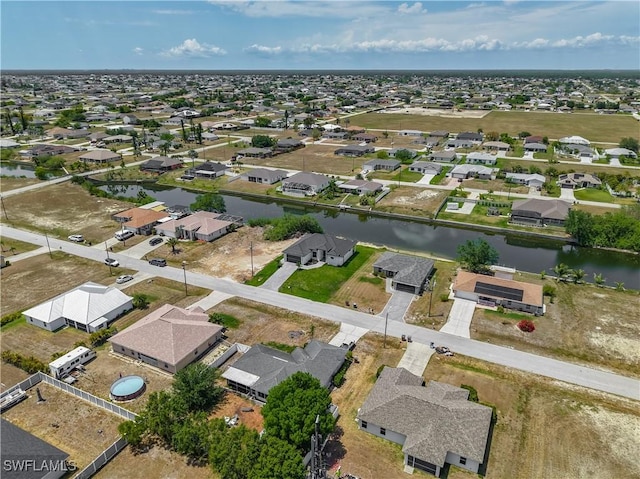 323 NE 19th Ter, Cape Coral, FL 33909 - aerial view of property's location featuring a large body of water and nearby suburban area