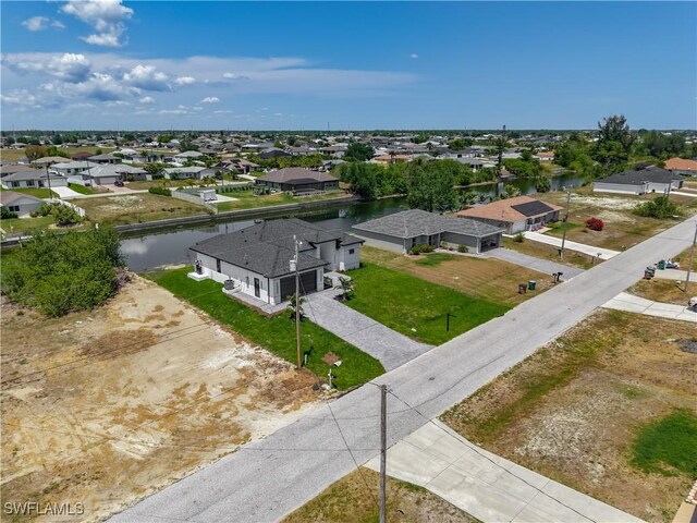 323 NE 19th Ter, Cape Coral, FL 33909 - aerial view of residential area featuring a nearby body of water