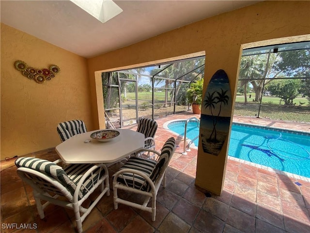19966 Lake Vista Cir, Lehigh Acres, FL 33936 - swimming pool featuring a patio area, a lanai, and outdoor dining space